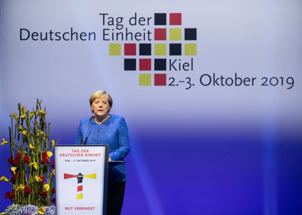 Bundeskanzlerin Angela Merkel (CDU) spricht beim Festakt zum Tag der Deutschen Einheit in Kiel 2019.