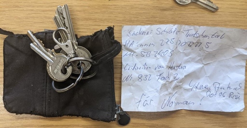 Schlüssel mit Notiz.