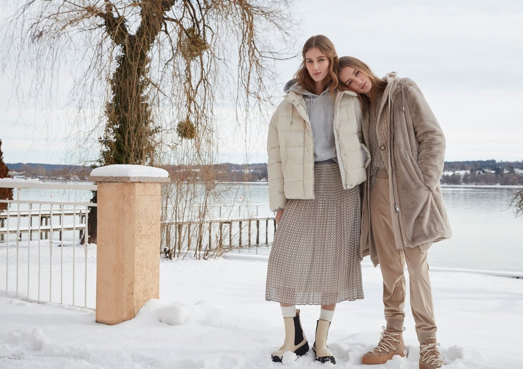Angesagt ist die Kombination des Plisseerocks mit Oversized-Oberteilen - wie etwa das Label Oui es macht, mit einem übergroßen Pullover und weiter Jacke (Rock ca. 120 Euro).