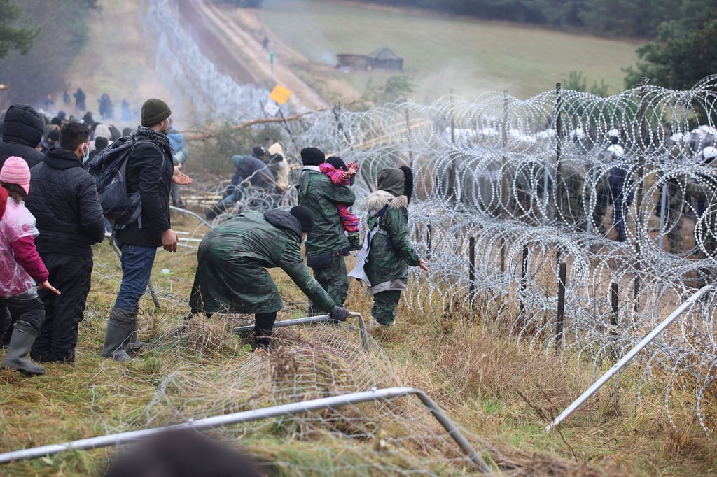 Flüchtlinge an der weißrussisch-polnischen Grenze.