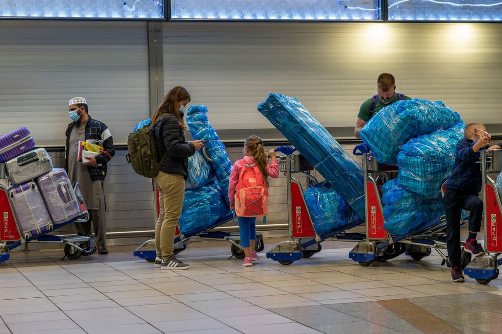 Reisende am Flughafen von Johannesburg. Symbolbild