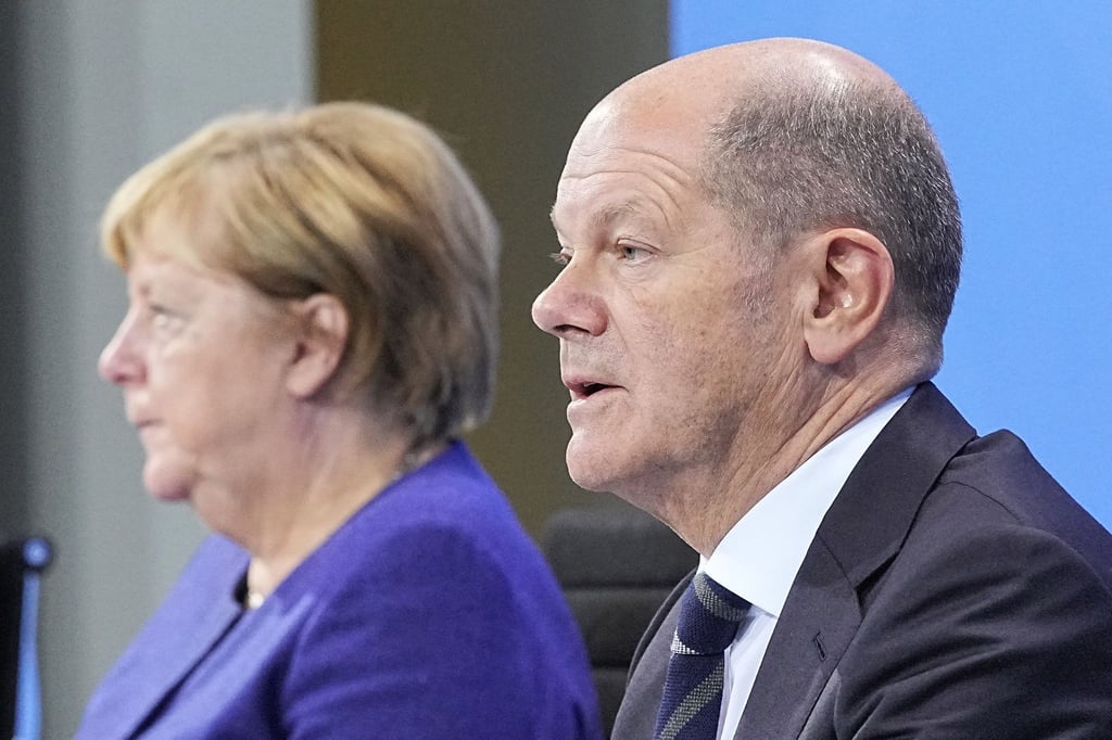 Die geschäftsführende Bundeskanzlerin Angela Merkel und ihr designierter Nachfolger Olaf Scholz bei einer Pressekonferenz im Bundeskanzleramt.