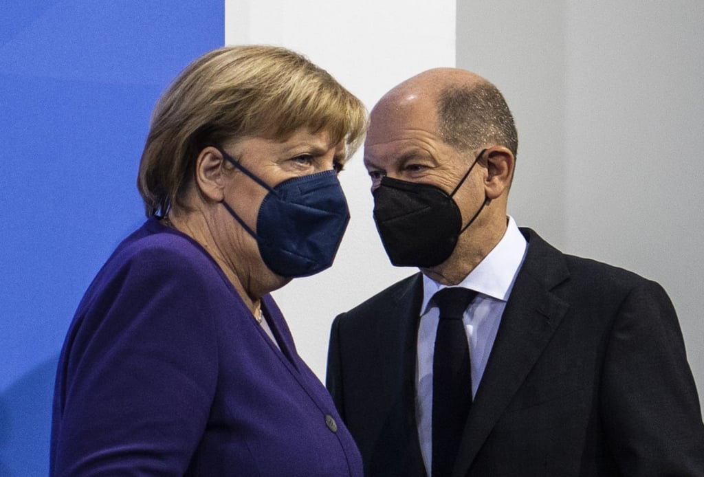 Angela Merkel (CDU) und Olaf Scholz (SPD)