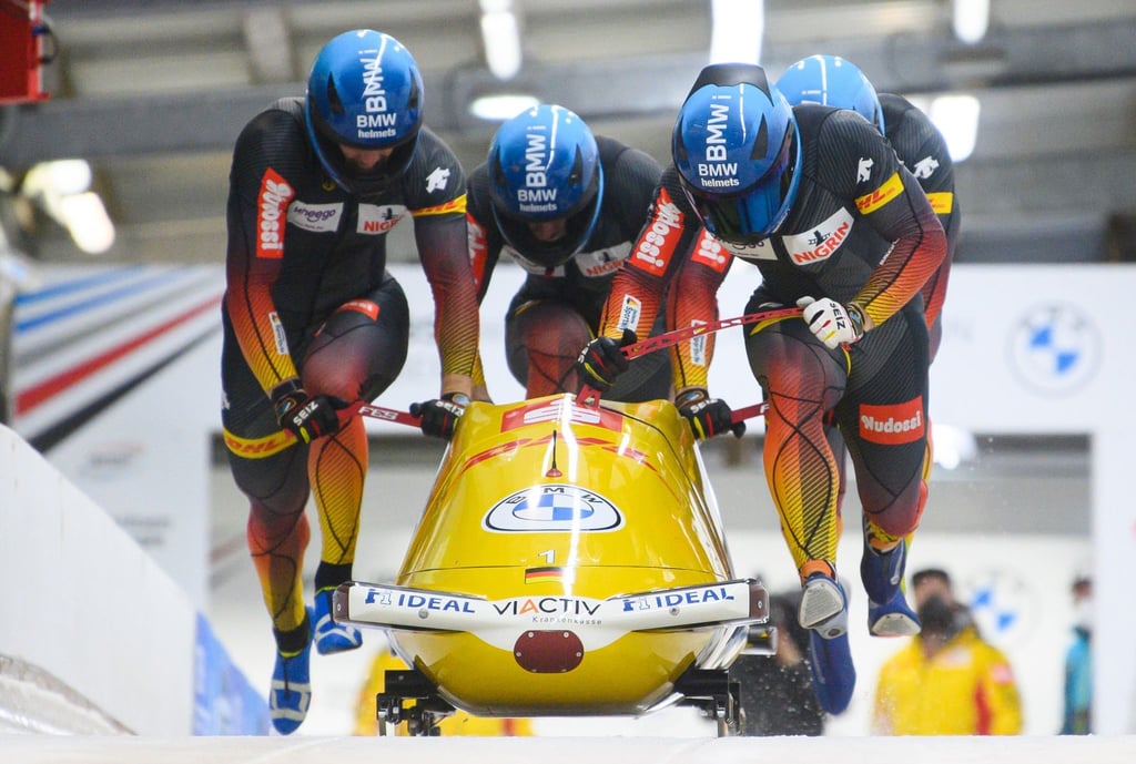 Am Start: Francesco Friedrich, Thorsten Margis, Candy Bauer und Alexander Schüller aus Deutschland schieben an.