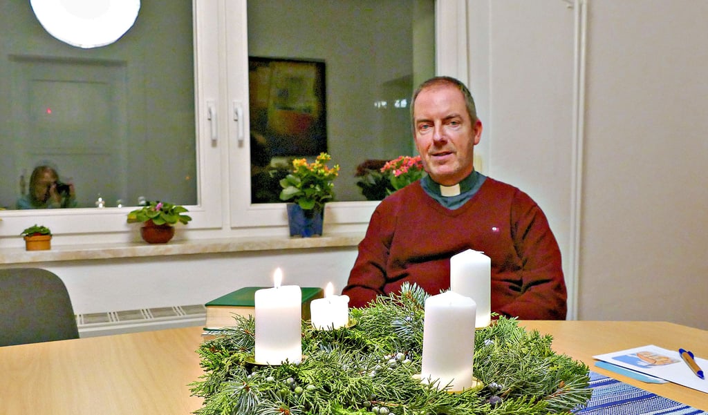 Pfarrer Michael Poschlod in seinem Büro im Pfarramt in Wittenberg