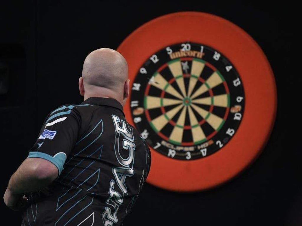 Rob Cross hat bei der WM in London sein Auftaktspiel gewonnen. Foto: Ina Fassbender