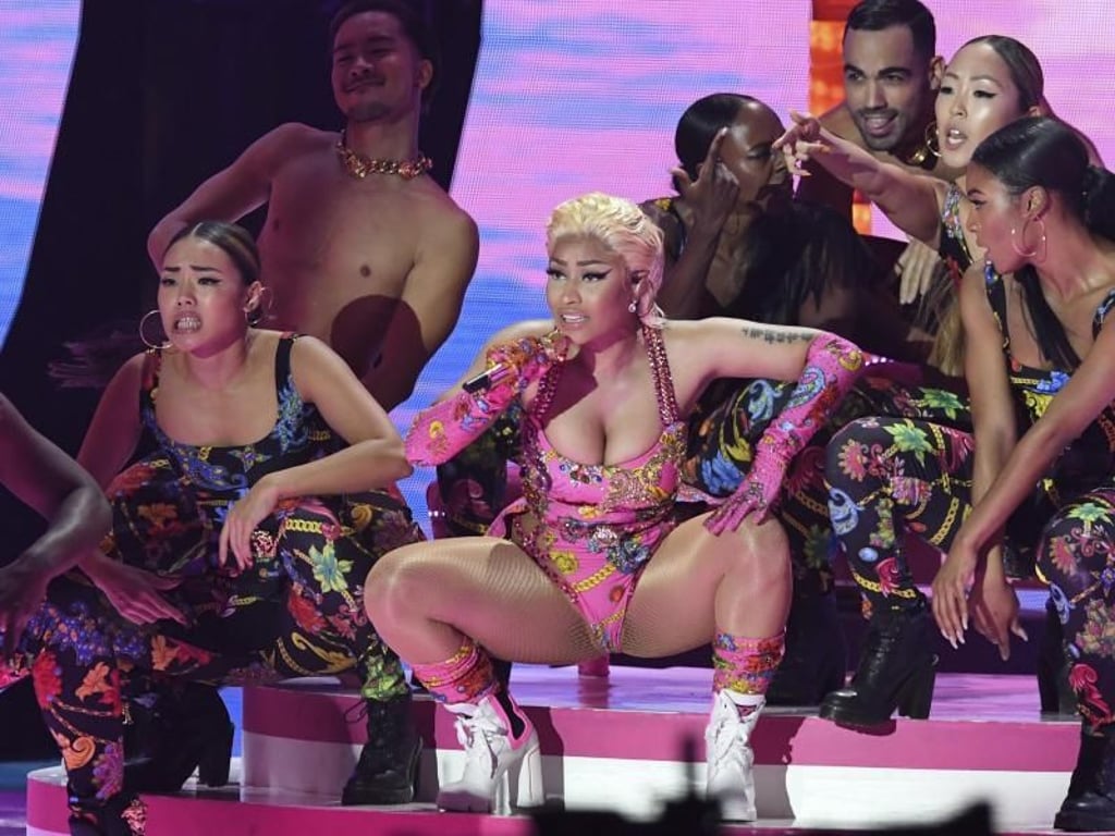 Rapperin Nicki Minaj (m.) mit ihrer Posse bei den MTV Europe Music Awards. Foto: Stuart C. Wilson