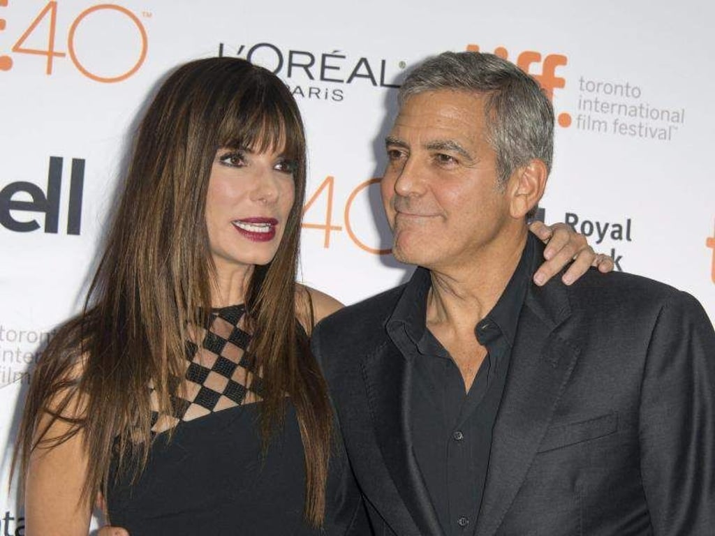 Sandra Bullock und George Clooney kennen sich schon seit ewigen Zeiten. Foto: Warren Toda