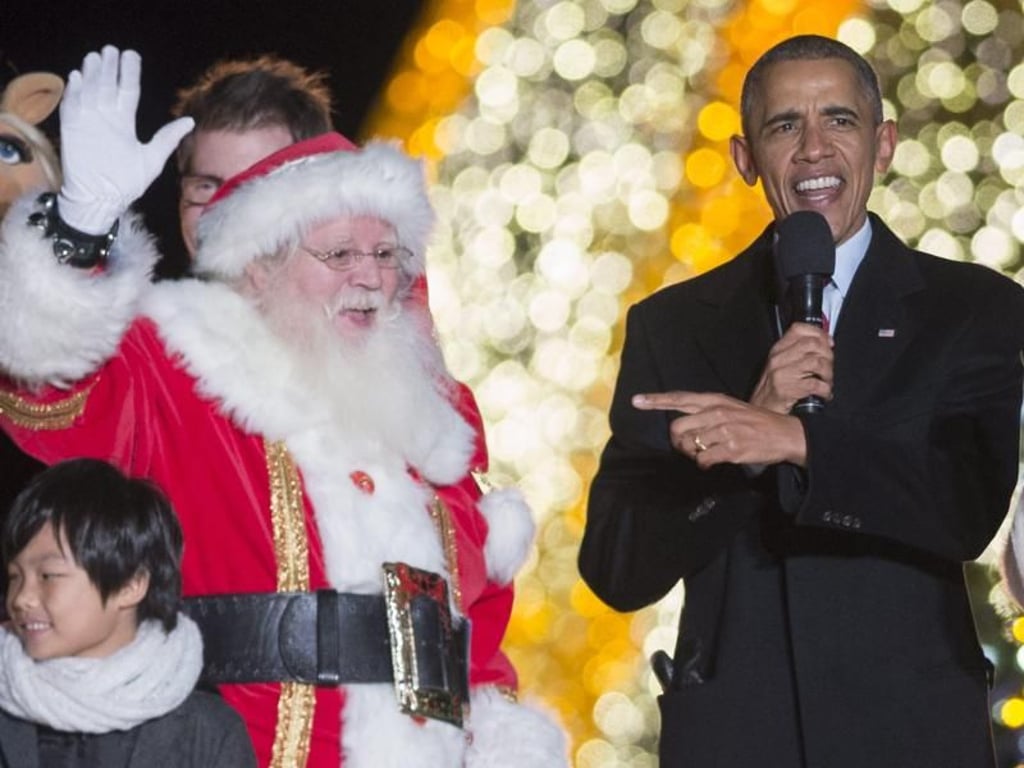 Barack Obama trifft den Weihnachtsmann. Foto: Michael Reynolds