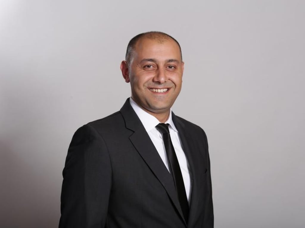 Tarkan Atik ist Experte bei der Dr. Klein-Baufinanzierung. Foto: Dr. Klein Privatkunden AG