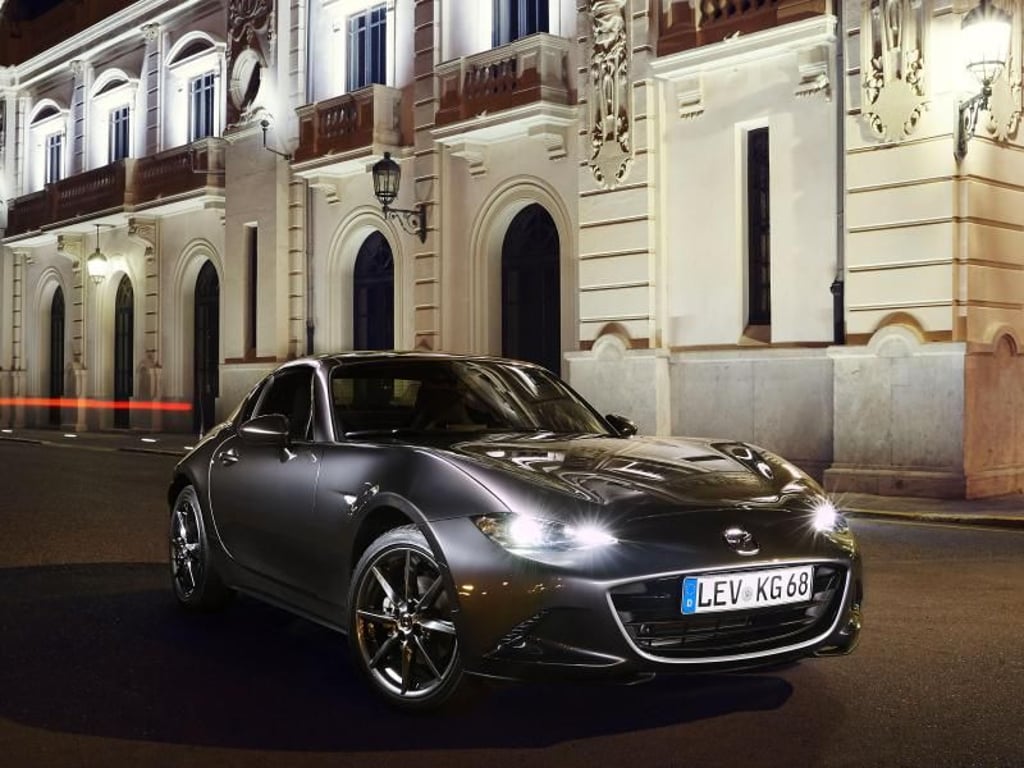 Geschlossen wie ein Coupé: Der neue Mazda MX-5 RF besitzt ein elektrisch versenkbares, festes Klappdach. Foto: Denis Meunier/Mazda/dpa-tmn