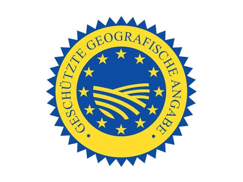 Das blaue EU-Gütezeichen steht für «Geschütze geografische Angabe» und kennzeichnet Produkte, bei denen eine spezifische Eigenschaft mit der Region verbunden ist. Foto: Europäische Kommission/dpa-tmn
