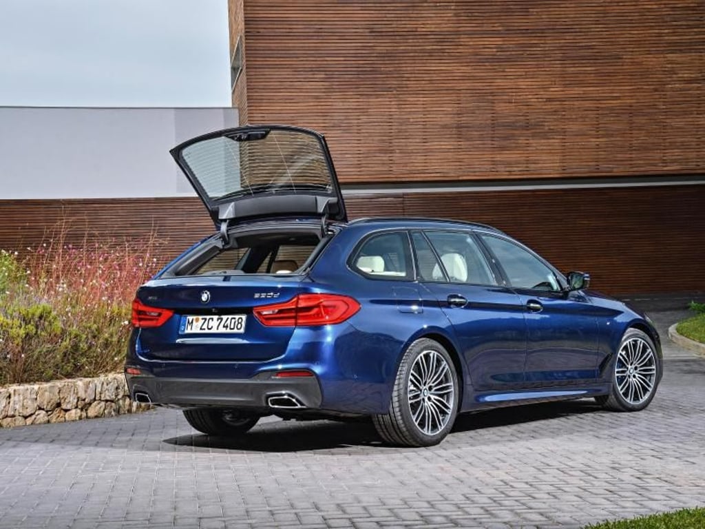 Im Alltag werden Touring-Fahrer die sensorgesteuerte Heckklappe mögen. Praktisch ist auch das Heckfenster, das man separat öffnen kann. Foto: BMW/dpa