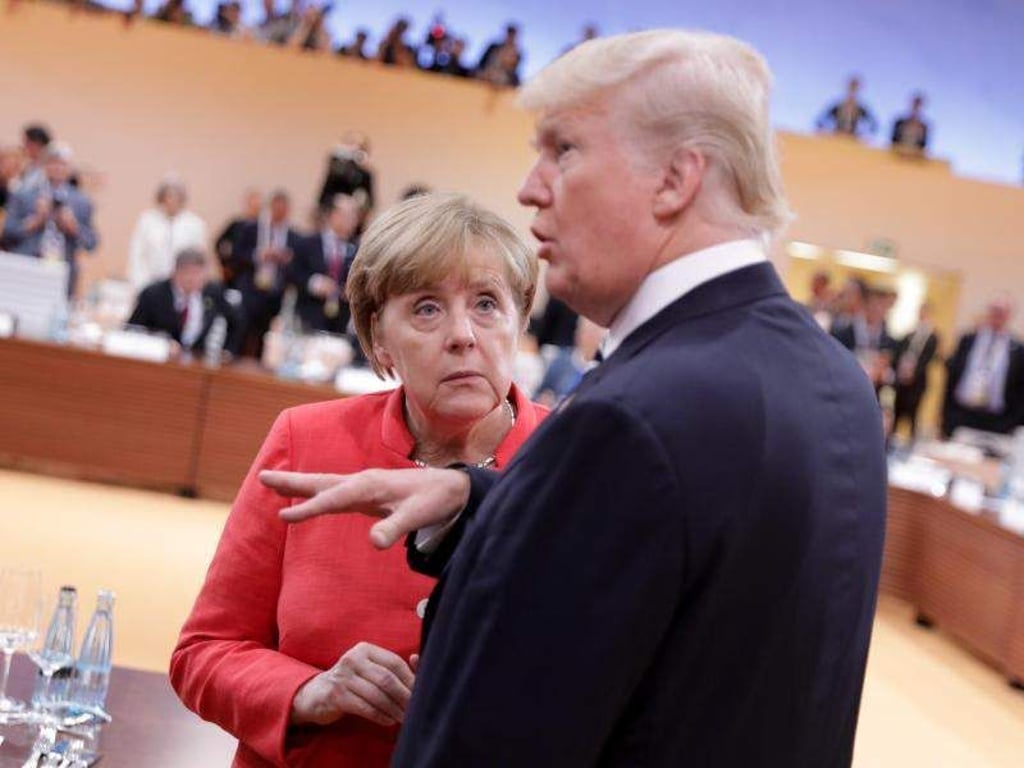 Der Präsident der Vereinigten Staaten von Amerika, Donald Trump, und Bundeskanzlerin Angela Merkel kommen beim G20-Gipfel 2017 in Hamburg zusammen. Die Art zu Blinzeln hat Einfluss auf das Redeverhalten eines Gesprächspartners. Foto: Kay Nietfeld