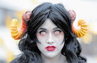 Cosplayer verkleiden sich als Manga- und Comic-Figuren.