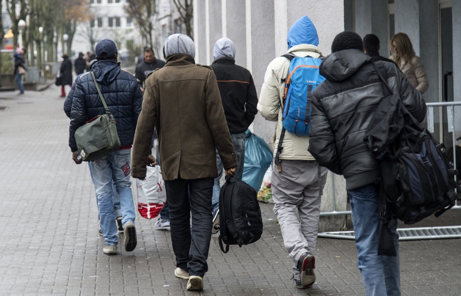 Flüchtlinge bei ihrer Ankunft in einer Aufnahmeeinrichtung.