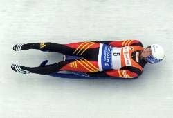 German Silke Kraushaar speeds down the ice channel in Igls on her way to win the luge world cup event here on Wednesday, 12 December 2001. dpa