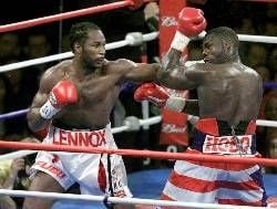 Lennox Lewis of the England (L) lands a punch to the face of Hasim Rahman (R) of the US during the third round of their WBC/IBF World Heavyweight Championship 17 November, 2001 at Mandalay Bay Events Center in Las Vegas, Nevada. Lewis won the fight in the fourth round with a knockout. dpa
