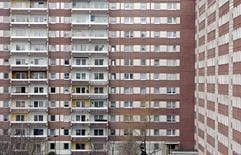 Blick auf elfgeschossige Plattenbauten im Neubaugebiet Grünau in Leipzig. (Foto: dpa)
