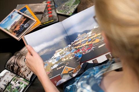 Urlaubserinnerungen im Großformat: Spektakuläre Bilder dürfen in einem Fotobuch ruhig für sich alleine stehen. (FOTO: DPA)