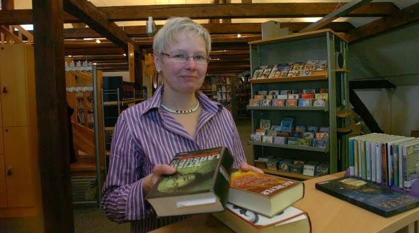 Kersten Walter lädt zum Schmökern und zur Aktionswoche in die Coswiger Stadtbücherei.