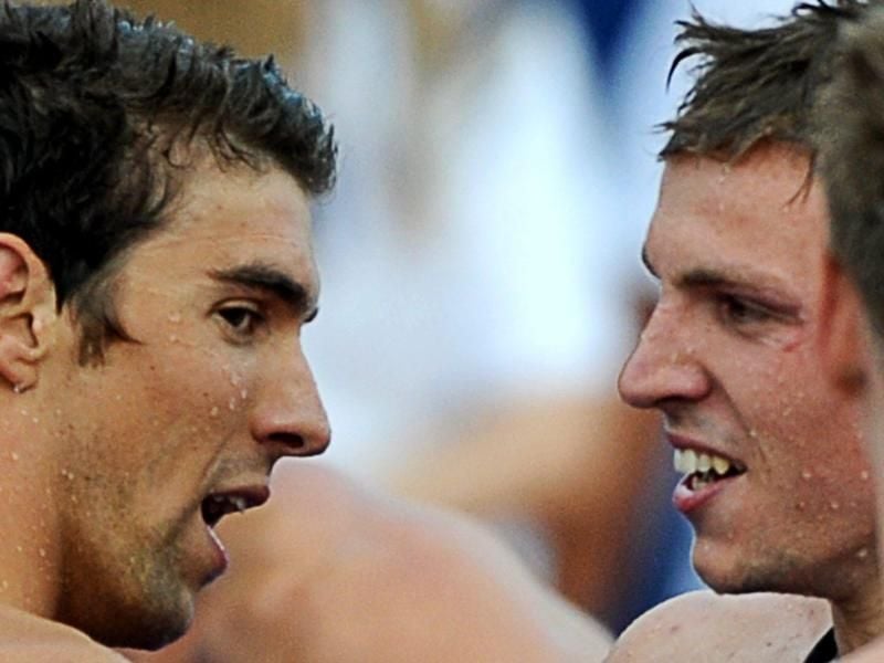 Michael Phelps (l) und Paul Biedermann bei der WM 2009 in Rom. Foto: Kerim Okten/EPA