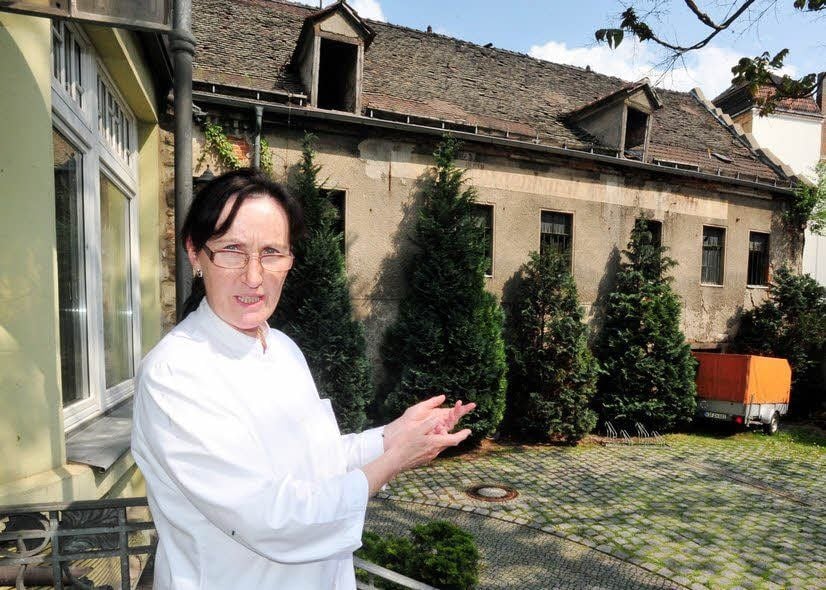 Zahnärztin Edith Schreiber ärgert das marode Umfeld in der Nachbarschaft.