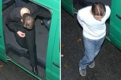 Vitali O. (l.) und Alex O., die beiden im Prozess um den Mord an einer Lehrerin aus Ahrensburg angeklagten Brüder, werden am Mittwoch (26. Oktober 2005) kurz vor der Urteilsverkündung in das Landgericht Lübeck gebracht. (Foto: dpa)