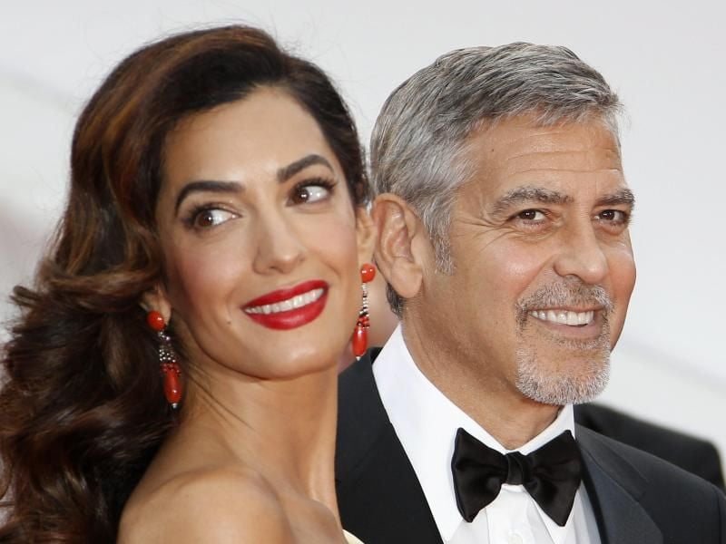 George und Amal Clooney 2016 in Cannes. Foto: Guillaume Horcajuelo