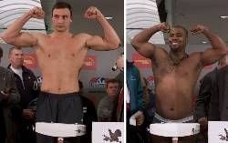 Beim offiziellen Wiegen stehen Schwergewichtsboxer Vitali Klitschko (l.) und Vaughn Bean am Donnerstag auf einer Waage in Braunschweig. Links unter dem Arm Klitschkos steht Trainer Fritz Sdunek. Am Freitag kämpft Titelverteidiger Vitali Klitschko aus Hamburg gegen Herausforderer Vaughn Bean (USA) in Braunschweig um den internationalen WBA-Boxtitel im Schwergewicht über 86,184 Kilogramm.