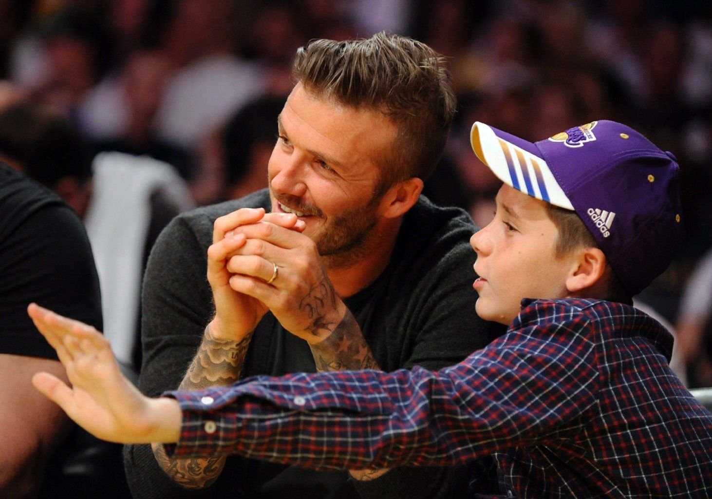David Beckham (l) und Sohn Brooklyn