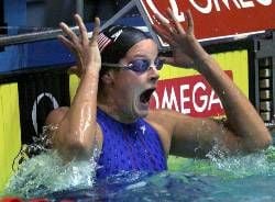 Lindsay Benko from USA jubilates after setting a new world record at the women's 200 m free style final clocking 1min 54.04sec at the World short course swimming championship (25 m) in Moscow, Sunday 07 April 2002. dpa