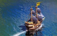 Es beginnt mit einer Reise: Am Anfang von «Anno 1701» macht sich der Spieler mit dem Schiff auf die Suche nach geeignetem Siedlungsgebiet. (Screenshot: dpa)