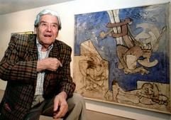 Roberto Matta erklärt sein Bild „I piedi del mondo“ auf einer Ausstellung in Barcelona (Dpa-Archivbild von 1999). Im Alter von 91 Jahren ist der Surrealist am Samstag in Rom gestorben.