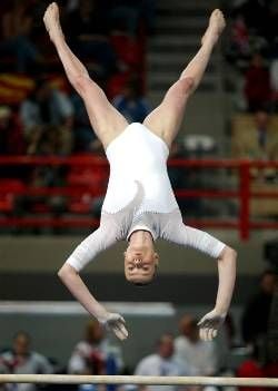 Russia's Svetlana Khorkina performs on the bars during the team competition at the Women's Artistic Gymnastic Championships in Patras 19 April 2002. Russia placed first, followed by the Netherlands and Italy. dpa