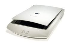 Verwandelt Bilder und Texte in Dateien - Flachbettscanner wie der HP Scanjet 2200C sind in vielen Büros zu einem unverzichtbaren Werkzeug geworden. (Foto: "Hewlett-Packard/dpa)