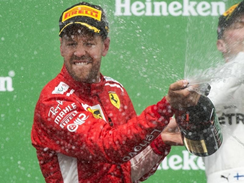Sebastian Vettel hat sich mit dem Sieg beim Großen Preis von Kanada die Führung in der Formel-1-WM zurückgeholt. Der Ferrari-Pilot verdrängte mit seinem 50. Grand-Prix-Sieg Titelverteidiger Lewis Hamilton von der WM-Spitze. Foto: Ryan Remiorz/The Canadian Press/AP
