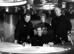 Die Filmszene aus dem Science-Fiction-Klassiker "Raumpatrouille Orion" zeigt (v.l.) Leutnant Mario de Monti (Wolfgang Völz), Major Cliff Allister McLane (Dietmar Schoenherr), Leutnant Tamara Jagellovsk (Eva Pflug) und Leutnant Hasso Sigbjoernson (Claus Holm) in ihrem Raumschiff (Archivbild von 1965). Aus den auf 35 Millimeter Schwarzweißfilm gedrehten Serien-Stunden von 1965/66 entstand eine Kinofassung der legendären TV-Serie Raumpatrouille Orion. Der "Producer Cut" der siebenteiligen Serie kommt am 24. Juli 2003 in die deutschen Kinos. (Foto: dpa/Bavaria Film-Produktion)
