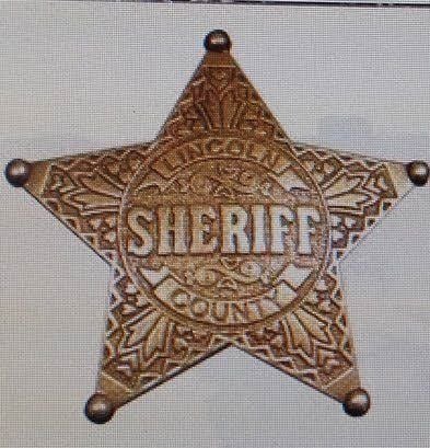 Ein fünfzackiger Sheriffstern.