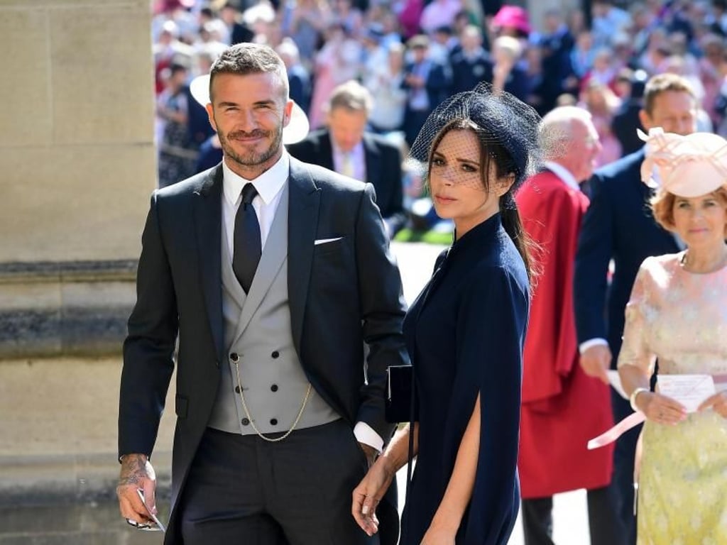David Beckham strahlt, seine Frau Victoria verzichtet - wie so häufig - auf ein Lächeln. Foto: Ian West/PA Wire