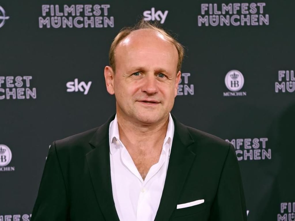 Der Schauspieler Oliver Stokowski während der Eröffnung des Filmfests in der bayerischen Landeshauptstadt. Foto: Tobias Hase