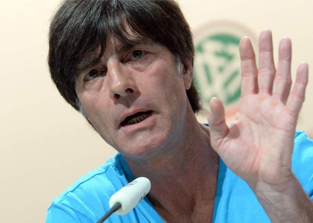 Head coach Joachim Loew gestures during a press conference of the German national soccer team in Santo Andre, Brazil, 12 June 2014. The FIFA World Cup 2014 will take place in Brazil from 12 June to 13 July 2014. Photo: Andreas Gebert/dpa +++(c) dpa - Bildfunk+++