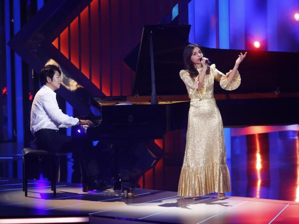 Lang Lang und Katie Melua spielen «What A Wonderful World». Foto: Hannibal Hanschke/Reuters
