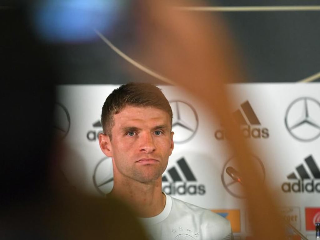 Thomas Müller bei einer Pressekonferenz in Sotschi. Foto: Ina Fassbender