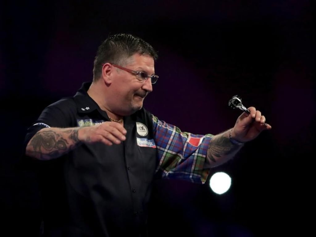 Der Schotte Gary Anderson ist bei der Darts-WM weiter im Rennen. Foto: John Walton/PA Wire