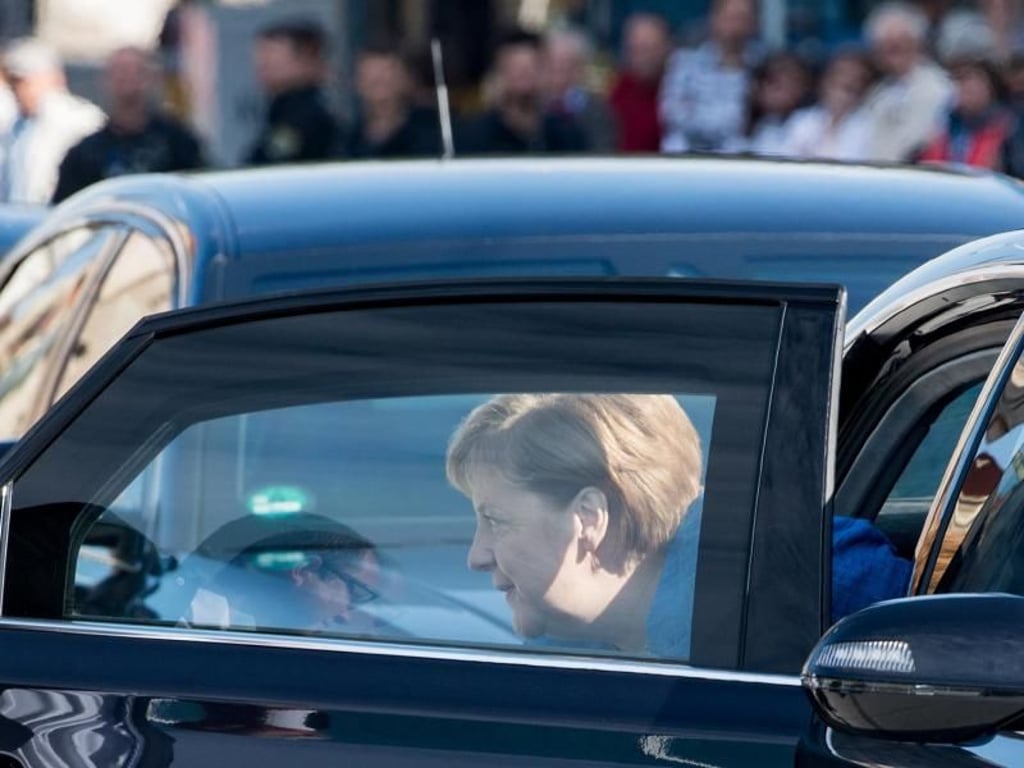 Die Kanzelerin fährt vor. Foto: Hendrik Schmidt