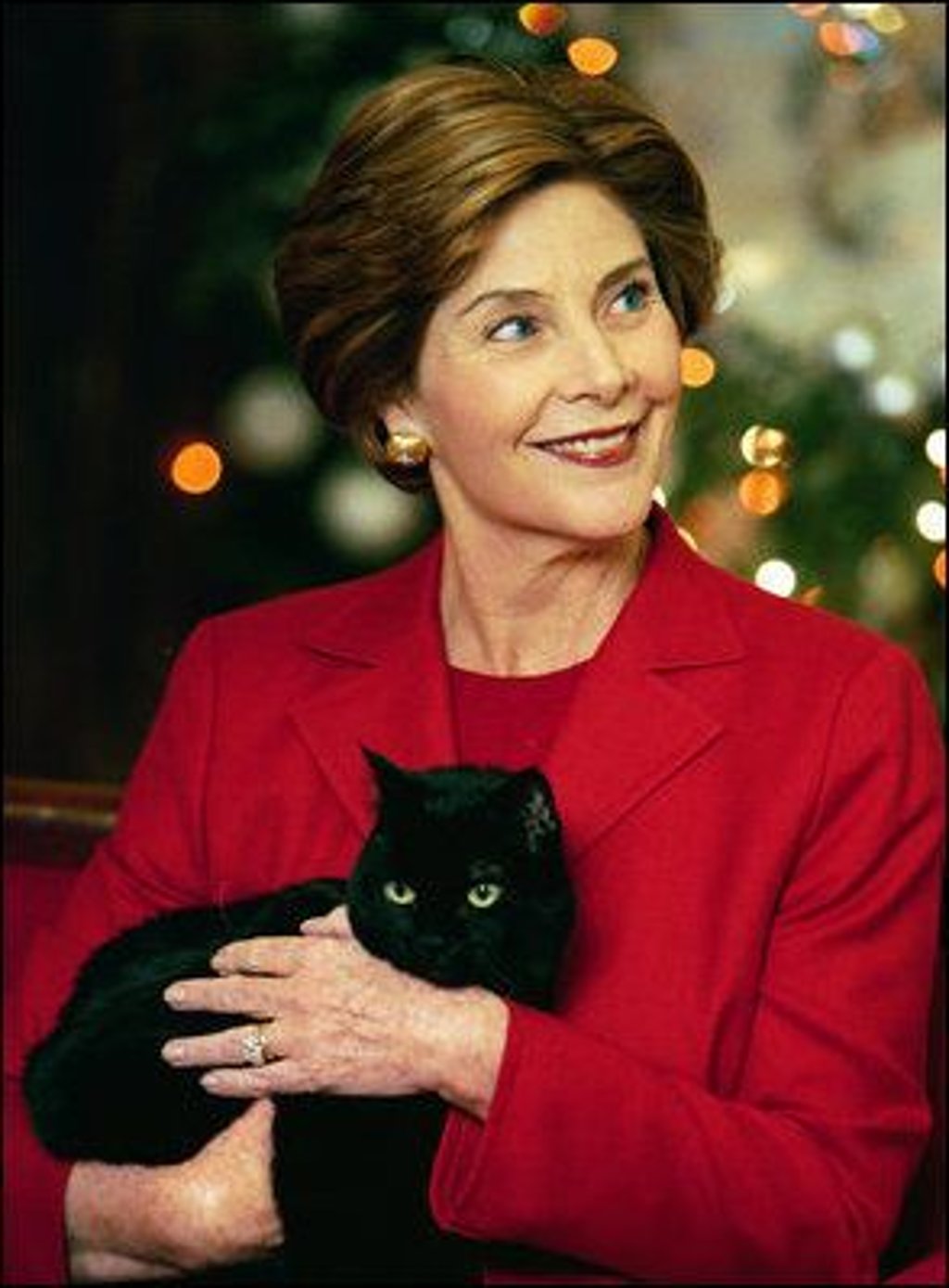 Laura Bush: Barney Cam. East Wing. State Floor. Portrait of Mrs. Bush holding Willie (aka India).