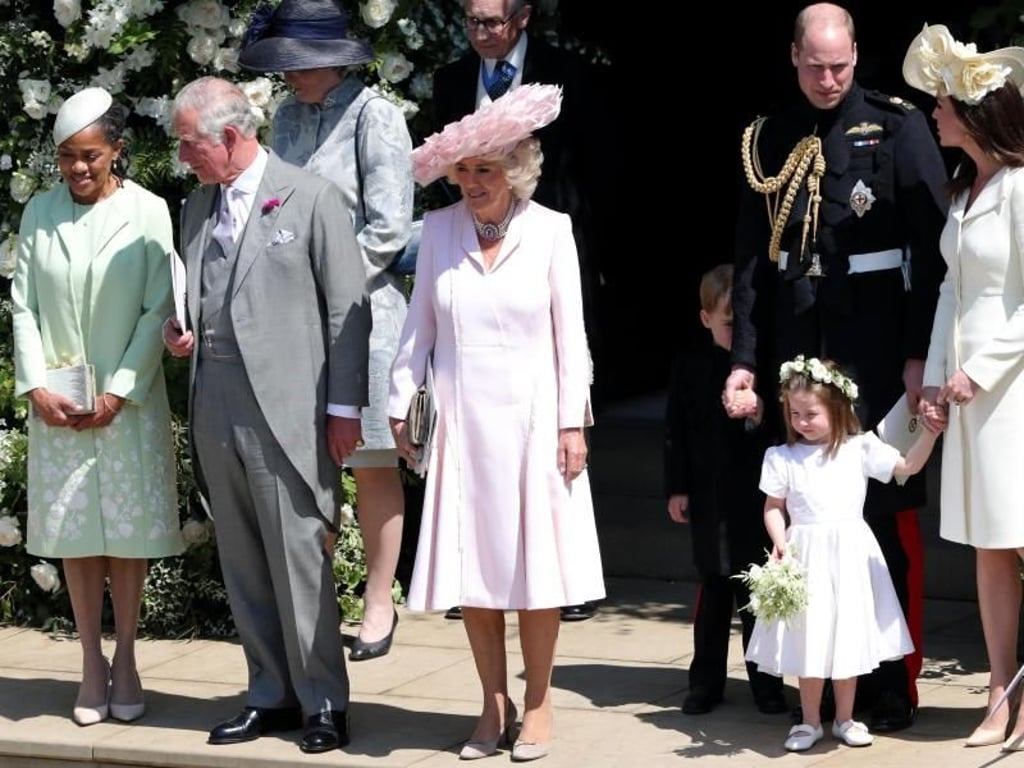 Doria Ragland (l-r), Mutter der Braut, Prinz Charles, Herzogin Camilla, Prinz William mit Prinz George, Herzogin Kate und Prinzessin Charlotte. Foto: Andrew Matthews/PA Wire