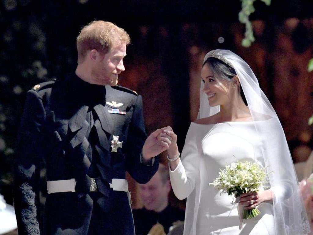 Traumwetter, Traumhochzeit, Traumpaar: Harry und Meghan verlassen nach der Trauung die St.-Georgs-Kapelle. Foto: Brian Lawless/PA Wire
