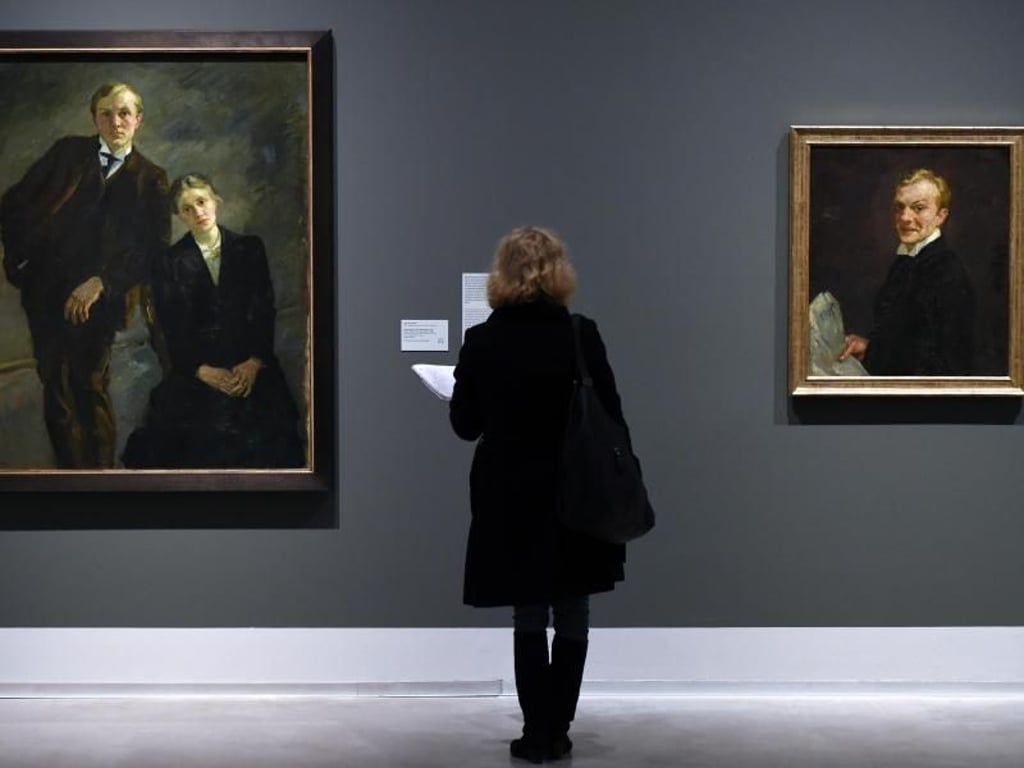 Die Gemälde "Doppelbildnis Max Beckmann und Minna Beckmann-Tube" (l, 1909) und "Selbstbildnis lachend" (1910/1911) von Max Beckmann in Berlin. Foto: Soeren Stach